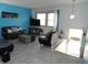 Living room featuring modern decor, bright accent wall, and ample natural light at 3426 Ireland Dr, Indianapolis, IN 46235
