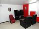 Entertainment room featuring a television and recliners at 3426 Ireland Dr, Indianapolis, IN 46235