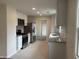 Beautiful kitchen featuring modern white cabinets, stainless steel appliances, and granite counters at 357 N 18Th Ave, Beech Grove, IN 46107