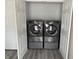Convenient laundry closet featuring modern side-by-side washer and dryer at 357 N 18Th Ave, Beech Grove, IN 46107