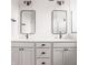 A well-lit bathroom features double sinks with modern fixtures and cabinetry at 401 Jersey St, Westfield, IN 46074