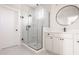 A stylish bathroom with glass shower, modern vanity, and neutral tile at 401 Jersey St, Westfield, IN 46074