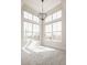 Bright bedroom featuring large windows and plush carpeting at 401 Jersey St, Westfield, IN 46074