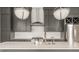Close-up of kitchen island with quartz countertop and stainless steel appliances at 401 Jersey St, Westfield, IN 46074