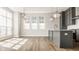 Stylish kitchen and dining area with large windows and contemporary lighting at 401 Jersey St, Westfield, IN 46074
