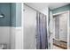 Bathroom boasts a shower with subway tile surround and a stylish shower curtain at 4050 Westover Dr, Indianapolis, IN 46268
