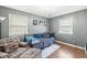 Inviting bedroom with a daybed, plush seating, chandelier, and warm natural lighting at 4050 Westover Dr, Indianapolis, IN 46268
