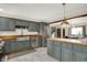 A kitchen with stainless appliances, modern cabinets, butcher block counters, and an open design at 410 E North St, Greenfield, IN 46140