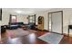 Comfortable living room featuring hardwood floors, natural light, and neutral decor at 410 E North St, Greenfield, IN 46140