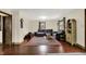 Spacious living room with hardwood floors, stylish furniture, and a view of built-in shelves at 410 E North St, Greenfield, IN 46140