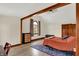 Charming main bedroom featuring a window, wooden trim, and neutral paint at 410 E North St, Greenfield, IN 46140
