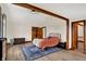 Large main bedroom with wood floors, a rug, and ample closet space for comfortable living at 410 E North St, Greenfield, IN 46140