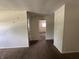 Living Room showcasing brown carpet and doorway views to other rooms at 4109 East 21St St, Indianapolis, IN 46218