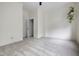 Bright bedroom with neutral walls and carpet, featuring a closet and traditional trim at 419 N College Ave, Indianapolis, IN 46202