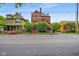 Charming red-brick two-story home with mature landscaping and classic architectural details at 419 N College Ave, Indianapolis, IN 46202