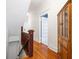 Upstairs hallway boasts original hardwood flooring and a built-in hutch at 419 N College Ave, Indianapolis, IN 46202