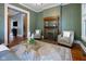 Inviting living room with a vintage fireplace, hardwood floors, and comfortable seating at 419 N College Ave, Indianapolis, IN 46202