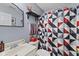 Functional bathroom with mirror, shelf decor and a colorful curtain adding a pop of style at 4195 Knollwood Ct, Franklin, IN 46131