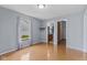 Bedroom with window and view of the yard, plus an adjacent bathroom at 4195 Knollwood Ct, Franklin, IN 46131