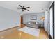 Bright living room with ceiling fan, hardwood floors, and a cozy couch at 4195 Knollwood Ct, Franklin, IN 46131