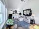 Stylish living room featuring a decorative fireplace, comfortable seating, and an artistic wooden USA map wall decor at 4284 E County Road 100 S, Avon, IN 46123
