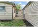 Backyard with brick patio, lush lawn and the home's exterior at 4432 Brittany Rd, Indianapolis, IN 46222