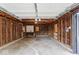 An empty unfinished garage awaits your personal touches at 4432 Brittany Rd, Indianapolis, IN 46222