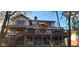 Multi-level deck offers a great view, outdoor dining space, and storage for kayaks at 448 Tamarack Ln, Noblesville, IN 46062