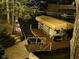 View of boat dock with a covered boat, alongside a landscaped walkway with stone steps at 448 Tamarack Ln, Noblesville, IN 46062