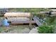Waterfront property featuring a private boat dock with access to the water, offering boating and recreational opportunities at 448 Tamarack Ln, Noblesville, IN 46062