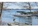 Scenic waterfront view with boat dock and lake access, perfect for enjoying waterside activities at 448 Tamarack Ln, Noblesville, IN 46062
