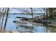 Scenic lake view with boat dock, perfect for enjoying waterside living with beautiful lake access and scenery at 448 Tamarack Ln, Noblesville, IN 46062
