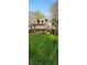 Charming two-story home with a well-manicured front lawn and covered front porch at 448 Tamarack Ln, Noblesville, IN 46062