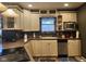 Cozy kitchen with neutral-colored cabinets and modern appliances, great for home-cooked meals at 448 Tamarack Ln, Noblesville, IN 46062