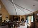 Spacious living room featuring vaulted ceilings, natural light, and comfortable seating arrangement at 448 Tamarack Ln, Noblesville, IN 46062