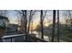 Waterfront view showcasing serene lake vistas from a deck, enhanced by lush greenery and inviting scenery at 448 Tamarack Ln, Noblesville, IN 46062