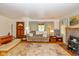 Inviting living room boasting hardwood floors, a fireplace, and a cozy, relaxing atmosphere at 4510 Gadsden St, Indianapolis, IN 46241