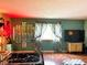 Comfortable living room with stylish curtains, hardwood floors, and modern decor at 4820 Nowland Ave, Indianapolis, IN 46201