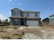 New construction two-story home with a neutral color scheme, a two-car garage, and professional landscaping at 50 Benfield Dr, Whiteland, IN 46184