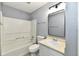 Functional bathroom with a tub-shower combination, toilet, and vanity with sink at 5005 Whisenand Dr, Indianapolis, IN 46254