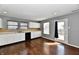 Bright kitchen with white cabinets, modern appliances, and access to the outdoor patio at 5005 Whisenand Dr, Indianapolis, IN 46254