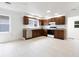Bright kitchen with stainless steel dishwasher and ample lighting at 52 N Ross St, Columbus, IN 47201