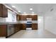 Spacious kitchen features updated appliances and plenty of cabinet space at 52 N Ross St, Columbus, IN 47201