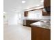 Bright kitchen featuring stainless steel appliances and tiled floors at 52 N Ross St, Columbus, IN 47201