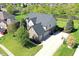 Charming two-story home with a basketball hoop and a long private driveway at 5942 Tioga Ct, Bargersville, IN 46106