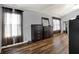 Large primary bedroom features wood flooring and lots of natural light at 5942 Tioga Ct, Bargersville, IN 46106