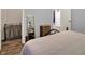 Bedroom featuring wood floors, ample storage, and neutral colors throughout at 5942 Tioga Ct, Bargersville, IN 46106