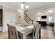 Dining area with view of living room and staircase at 5942 Tioga Ct, Bargersville, IN 46106