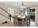 Dining room view with outdoor access and staircase at 5942 Tioga Ct, Bargersville, IN 46106