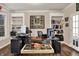 Home office with two built-in bookcases and a dark wood floor at 5942 Tioga Ct, Bargersville, IN 46106